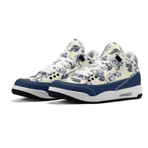 Zapatillas retro de baloncesto con estampado floral vintage en azul y dorado, mostrando tobillo alto acolchado y suela de goma antideslizante."