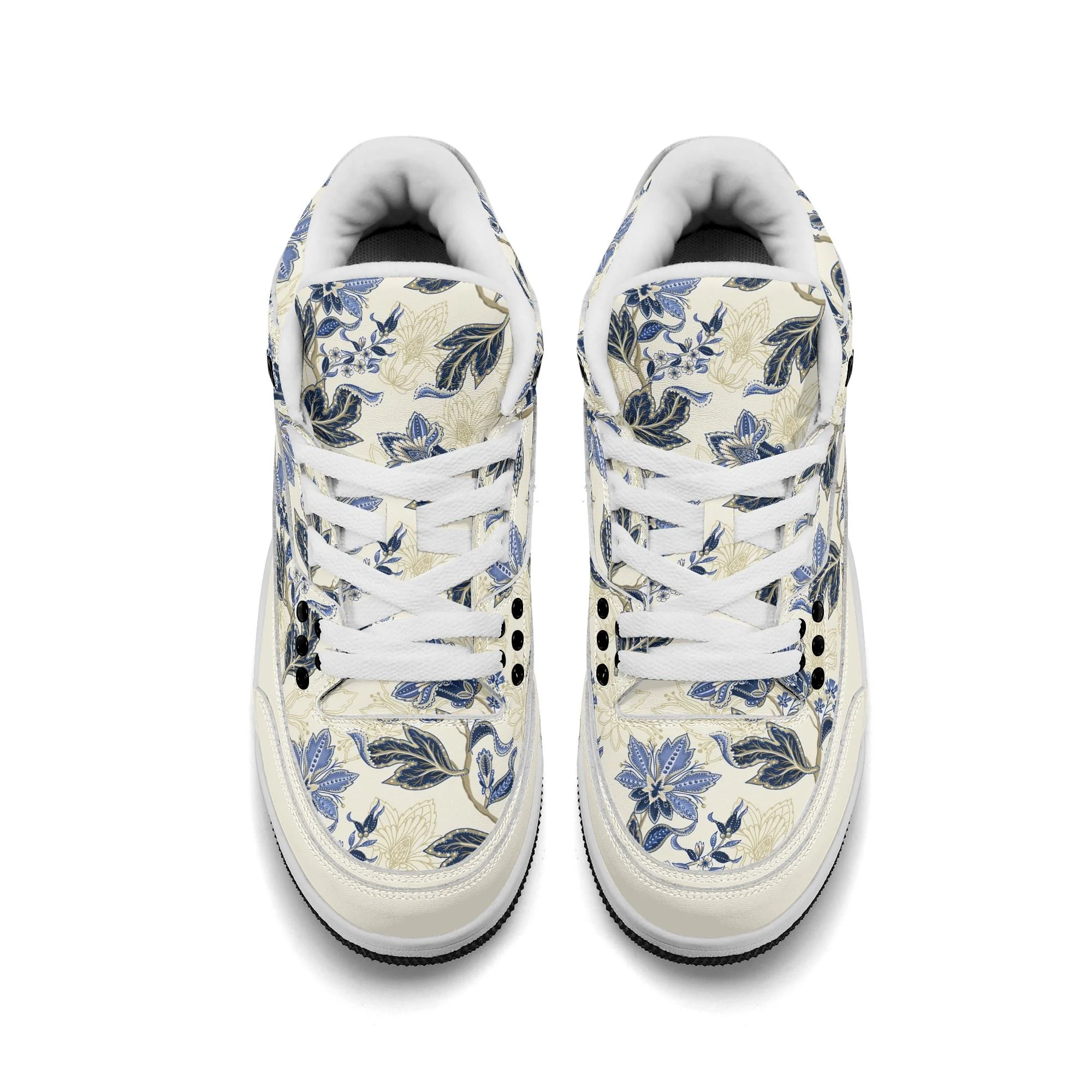 Zapatillas retro de baloncesto en color crudo con estampado floral vintage en azul y dorado, mostrando tobillo alto acolchado y suela antideslizante.