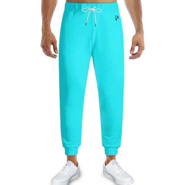 Pantalón Deportivo Turquesa - Joggers unisex en azul turquesa vibrante con ajuste elástico y cordón ajustable. Ideal para un look moderno y cómodo.