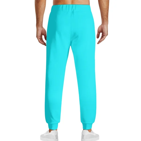 Pantalón Deportivo Turquesa - Joggers unisex en azul turquesa vibrante con ajuste elástico y cordón ajustable. Ideal para un look moderno y cómodo.