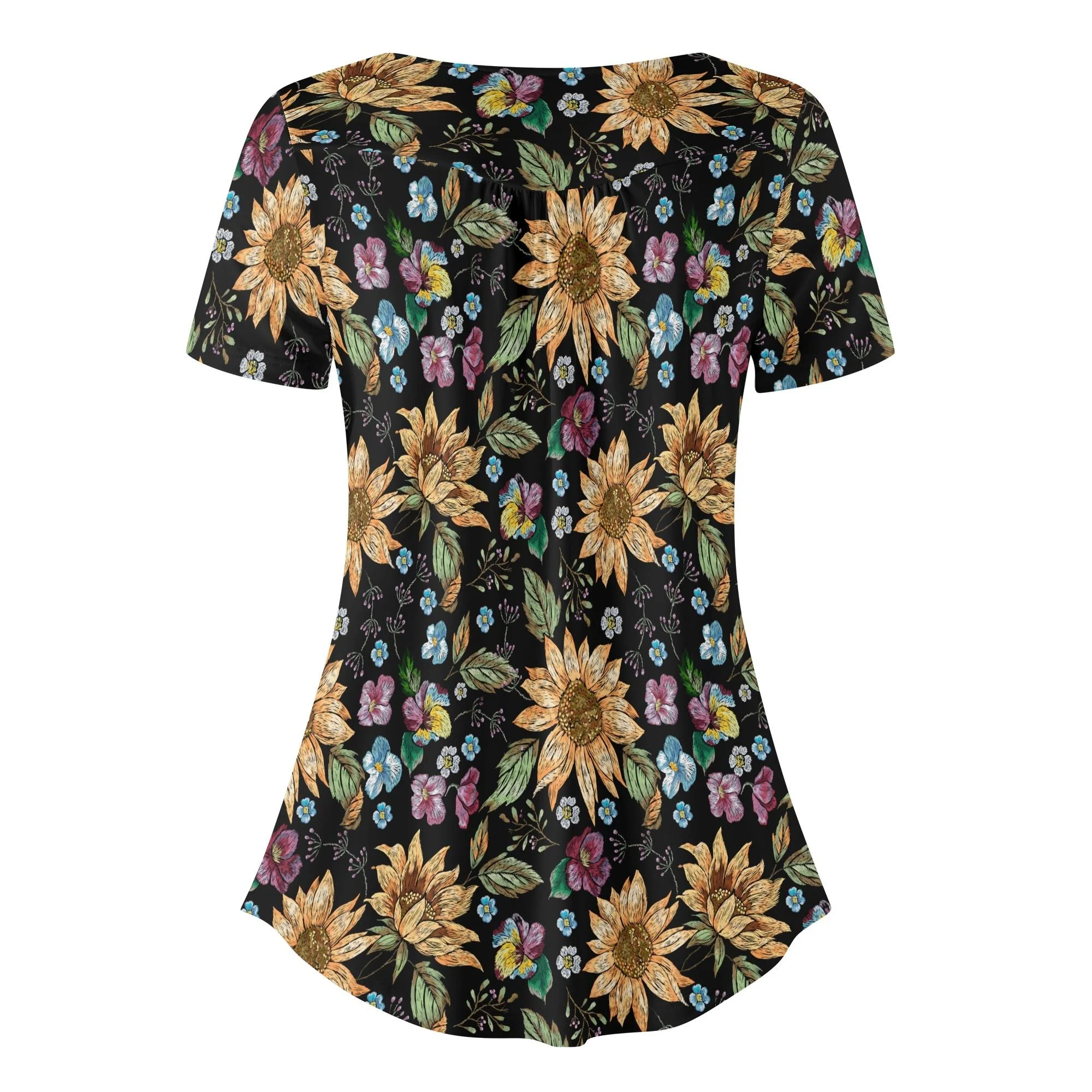 Detalle del diseño de la Blusa Floral Chic, mostrando los girasoles y flores en tonos vibrantes.