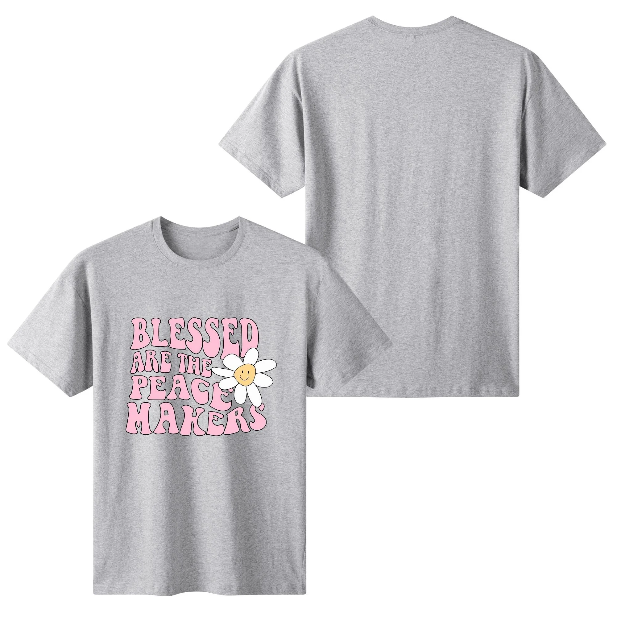 Camiseta rosa claro para mujer con estampado floral retro y frase "BLESSED ARE THE PEACE MAKERS" en tipografía años 70.