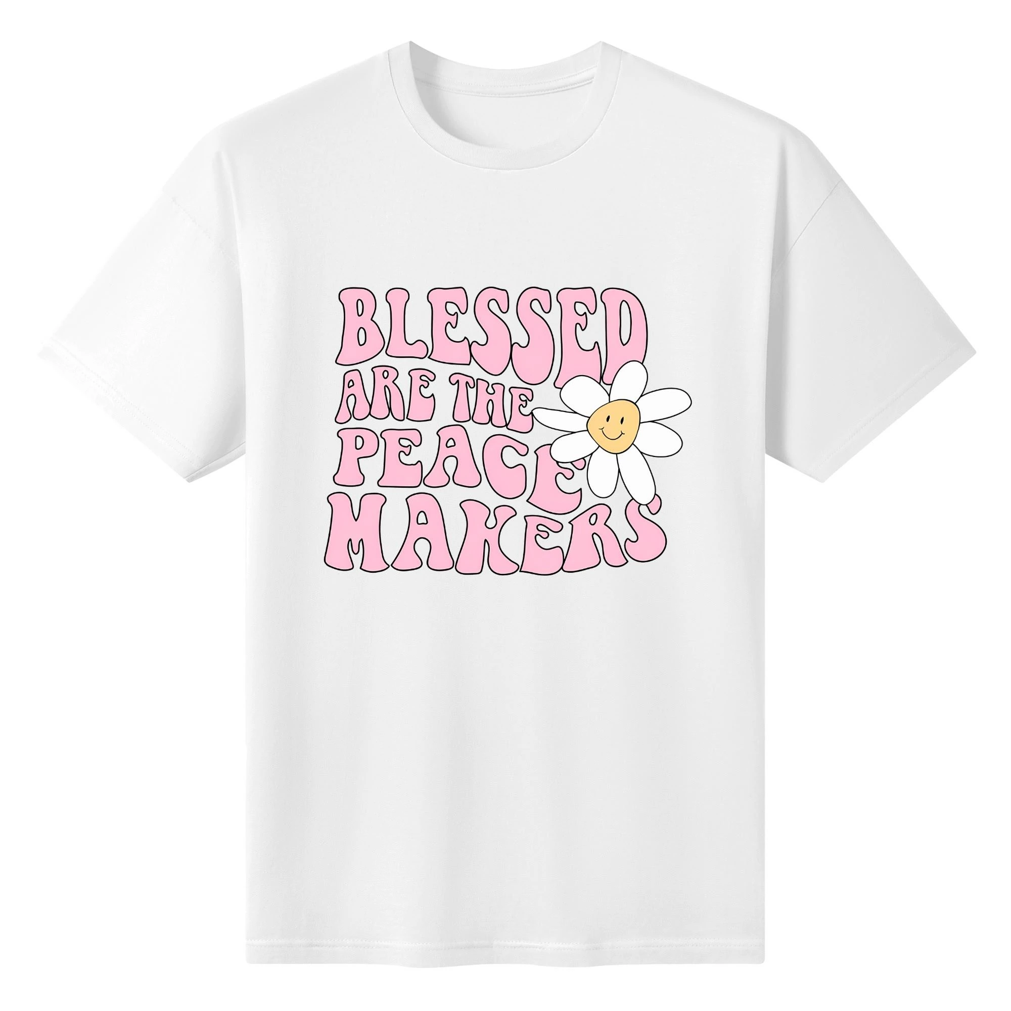 Camiseta rosa claro para mujer con estampado floral retro y frase "BLESSED ARE THE PEACE MAKERS" en tipografía años 70.