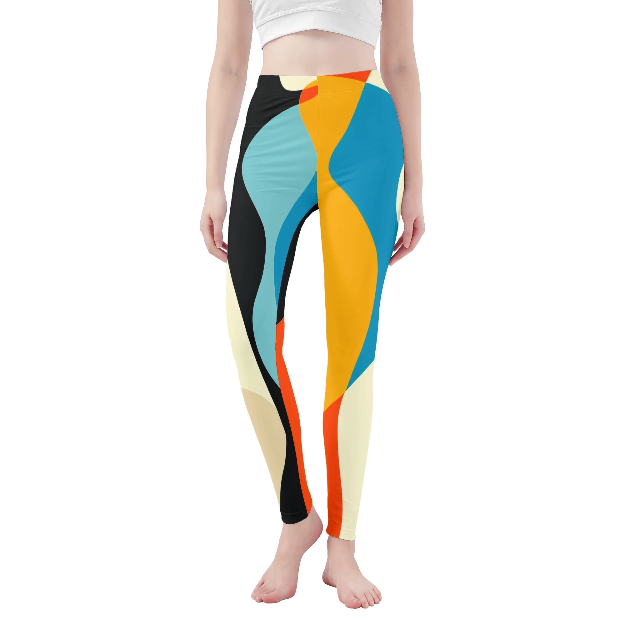 Vista frontal de los leggings “Movimiento Fluido” en pose de yoga, destacando el patrón de colores vivos.