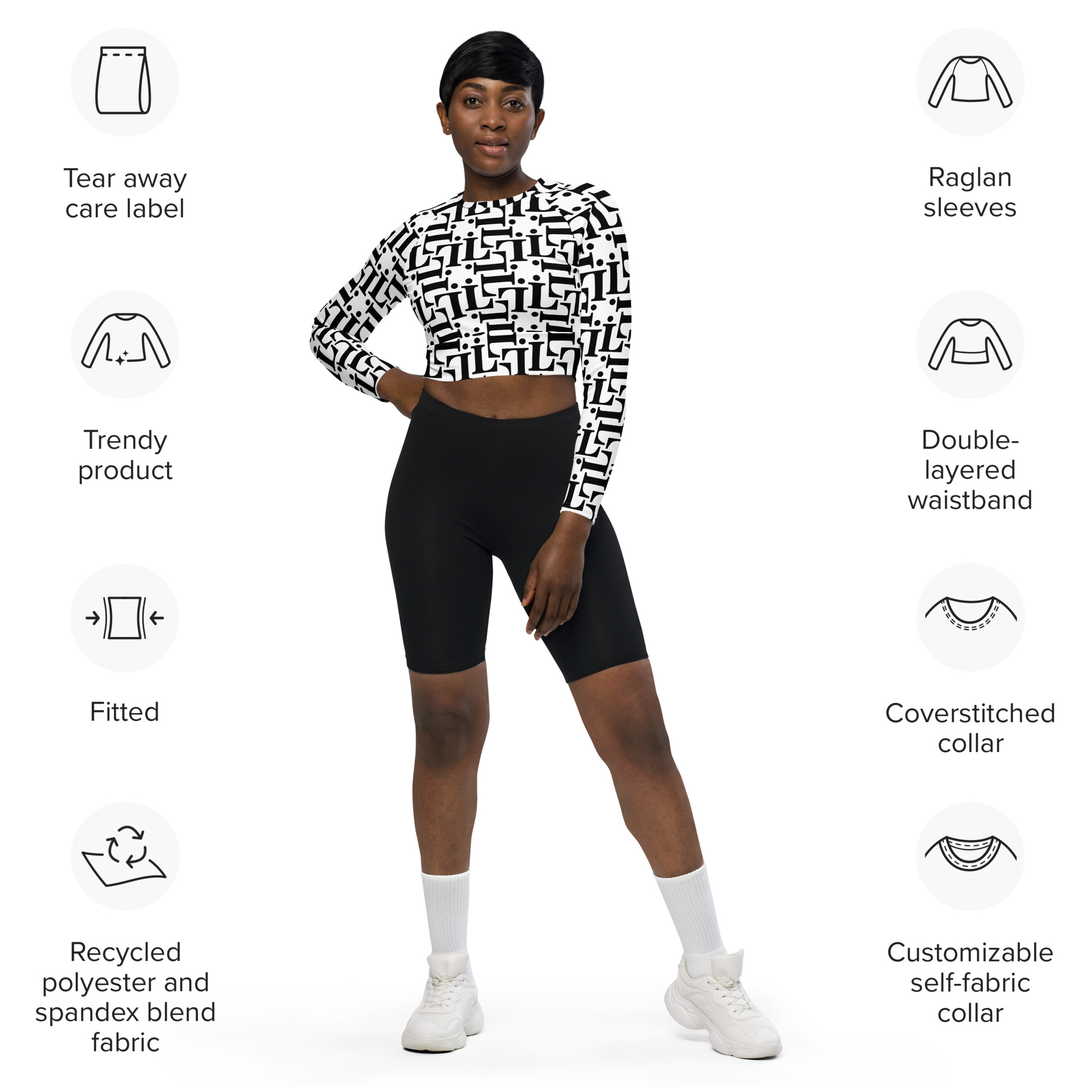 Mujer con top corto manga larga con estampado tipográfico integral blanco y negro – colección CODE NOIR