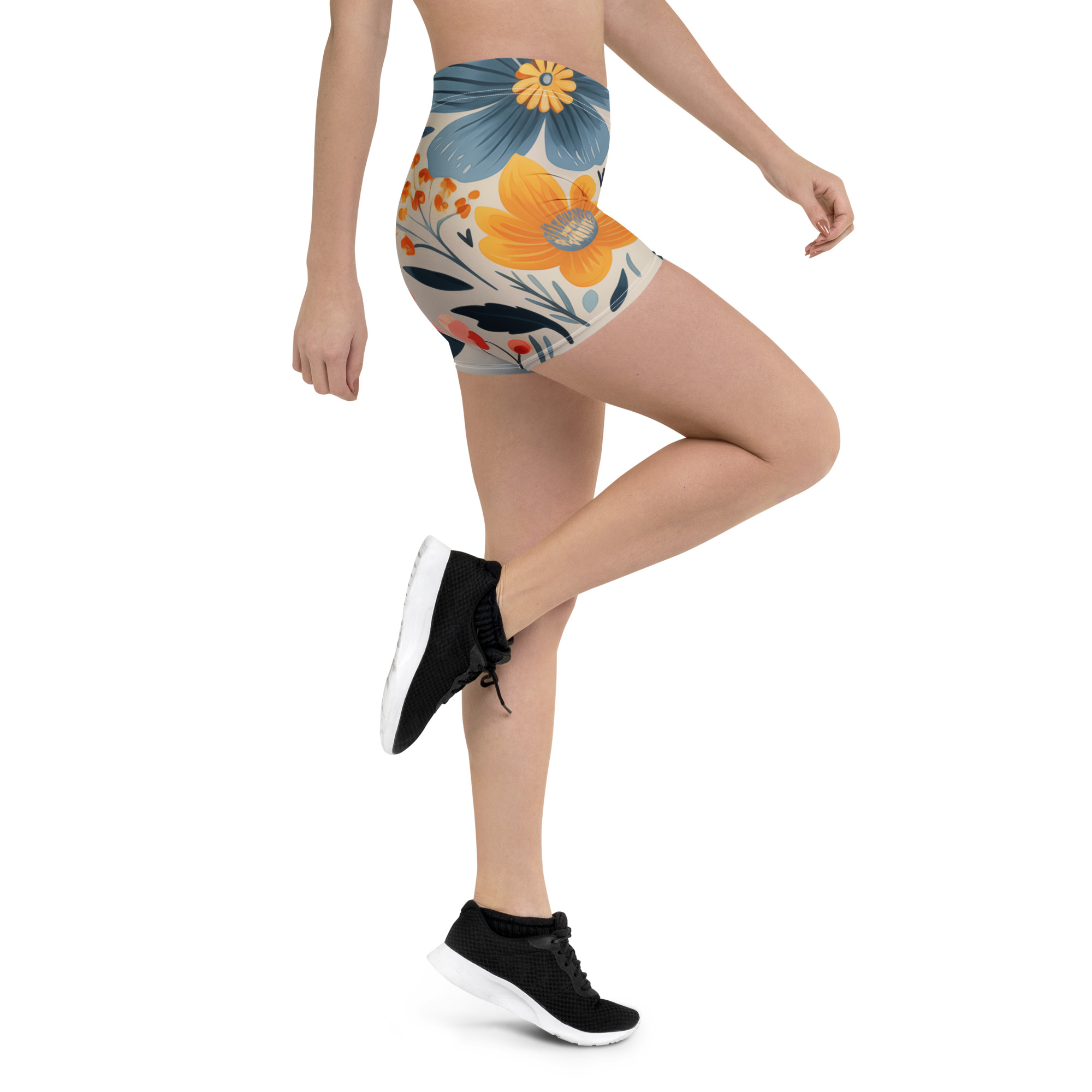 Mockup frontal de mujer luciendo shorts deportivos con estampado floral escandinavo vibrante.