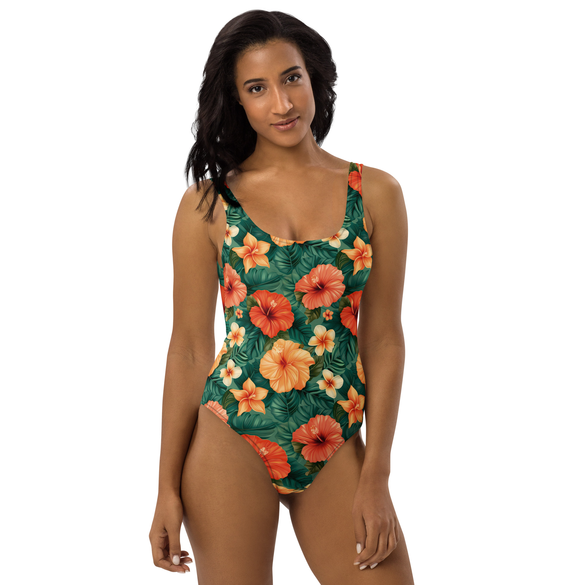Mujer luciendo bañador floral tropical con fondo verde, ideal para playa o piscina