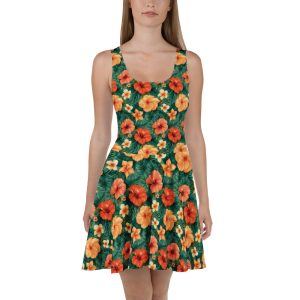 Mujer con vestido skater de flores hibisco rojas, naranjas y amarillas sobre fondo verde – colección Tropic – Heat.