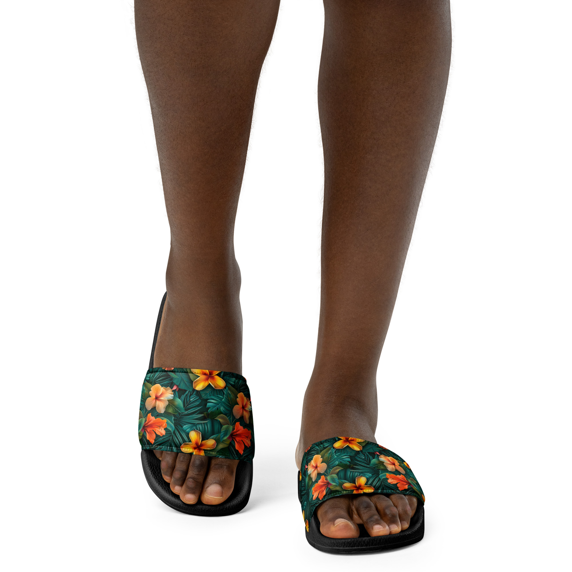 Sandalias negras con tira de flores tropicales naranjas y amarillas sobre fondo verde – colección Tropic – Heat.