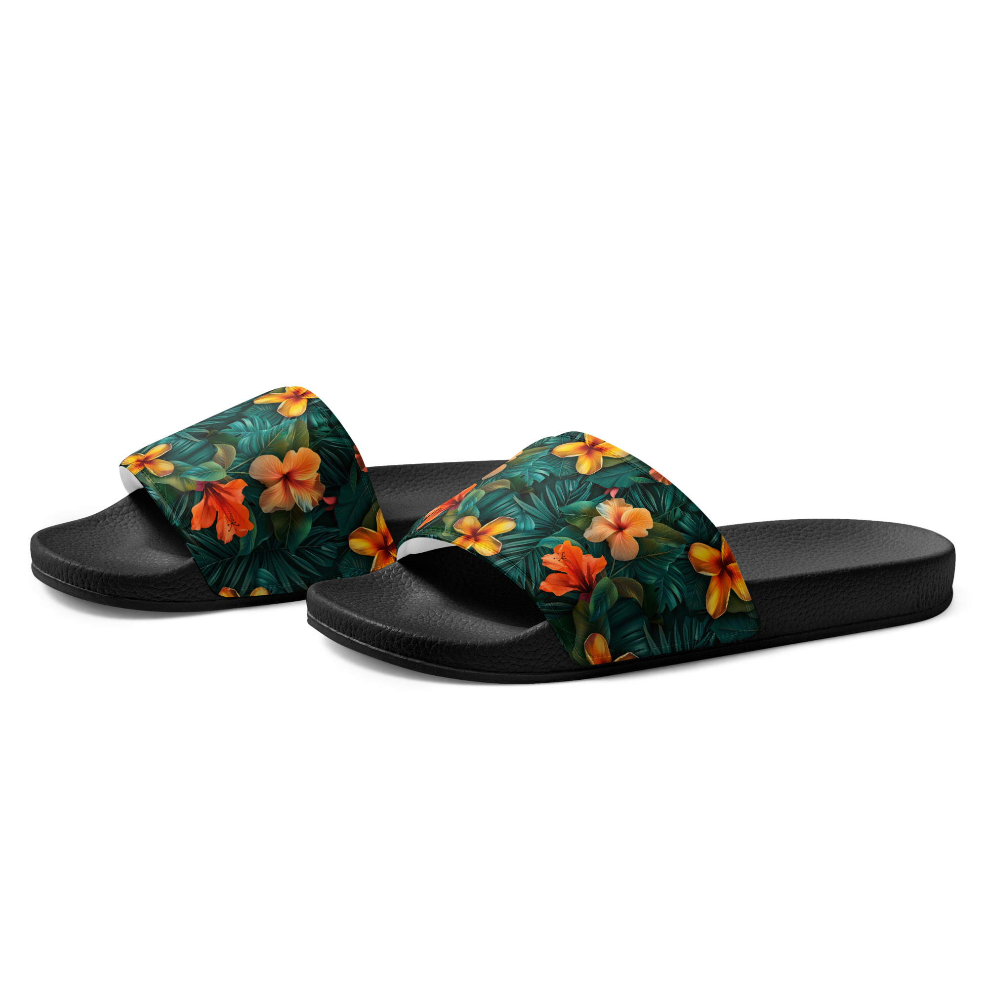 Sandalias negras con tira de flores tropicales naranjas y amarillas sobre fondo verde – colección Tropic – Heat.